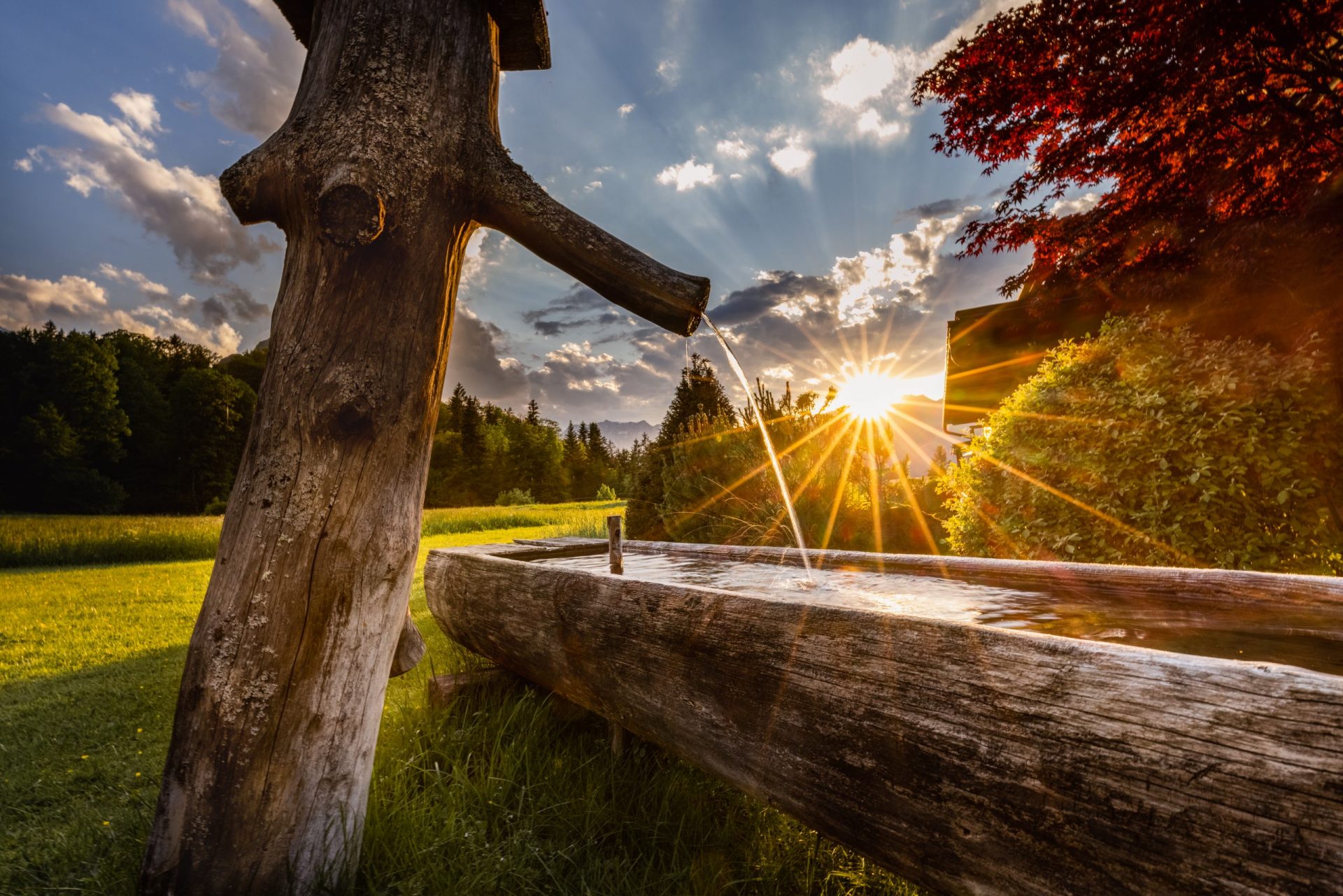 Hotel Alpenhof, Berchtesgaden, Brunnen im Sonnenuntergang